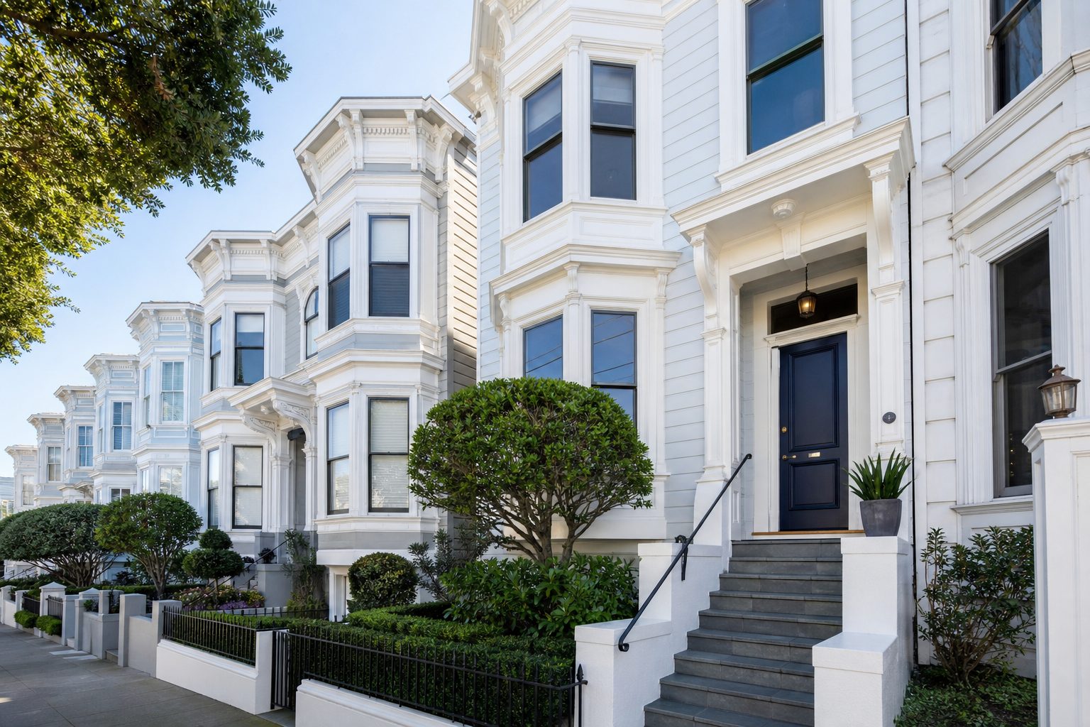 White San Francisco row houses on a sunny street in Pacific Heights