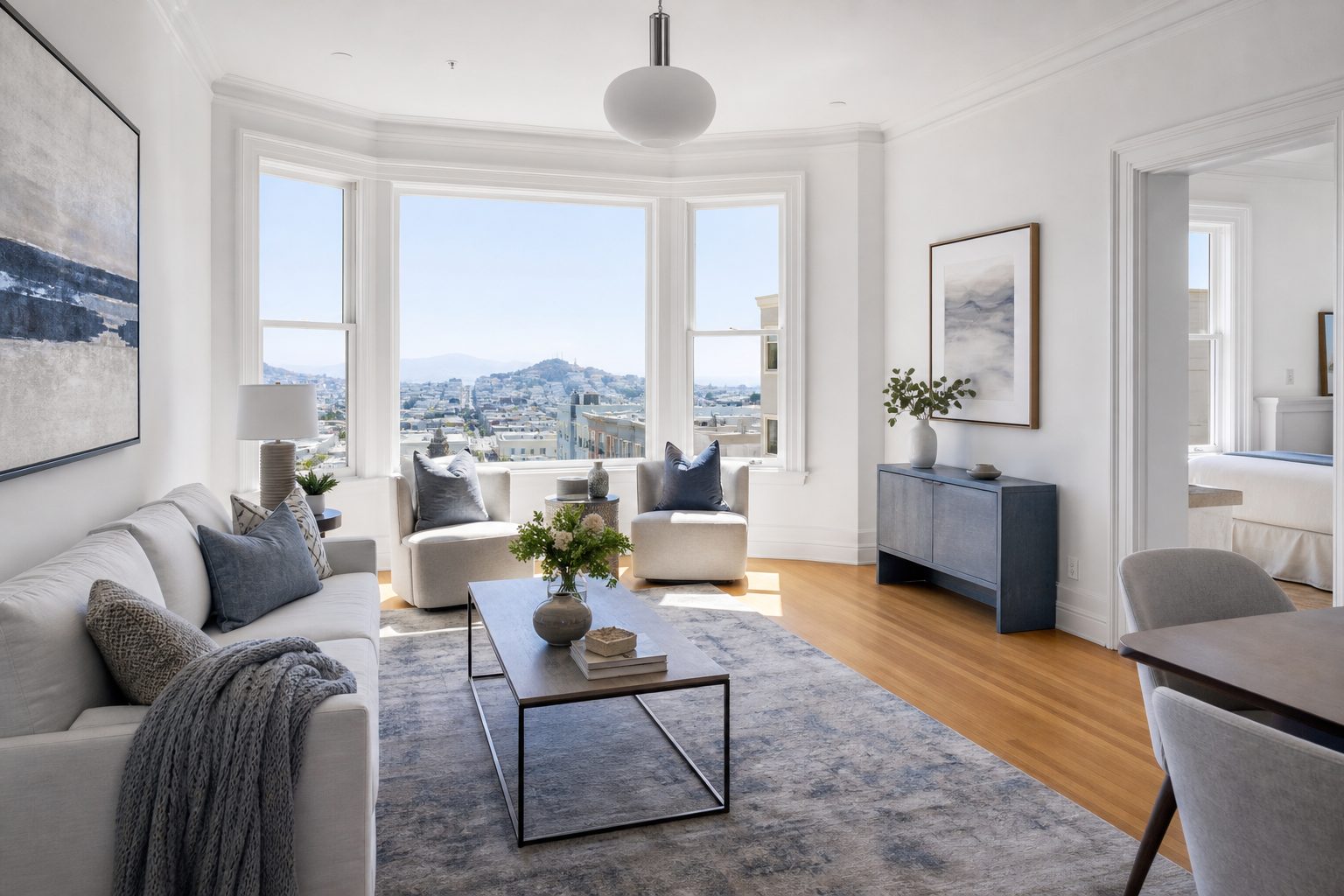 Bright San Francisco living room with a bay window and oak floors